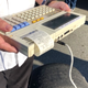 Illustration for article titled This Ancient Laptop/Printer Is How You Recorded Race Car Data in 1990